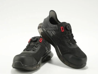 Avanço técnico! Os sapatos de segurança com salto moldado patenteados da Qixi...